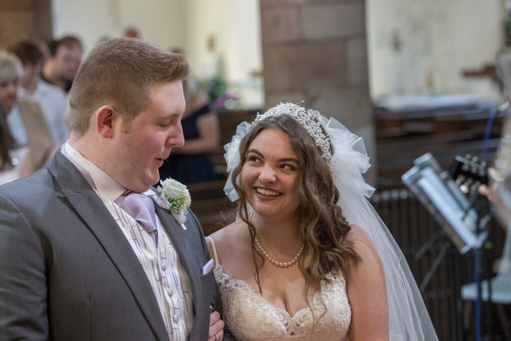 Lacy & Jordan - Groom waiting for his beautiful bride at the alter