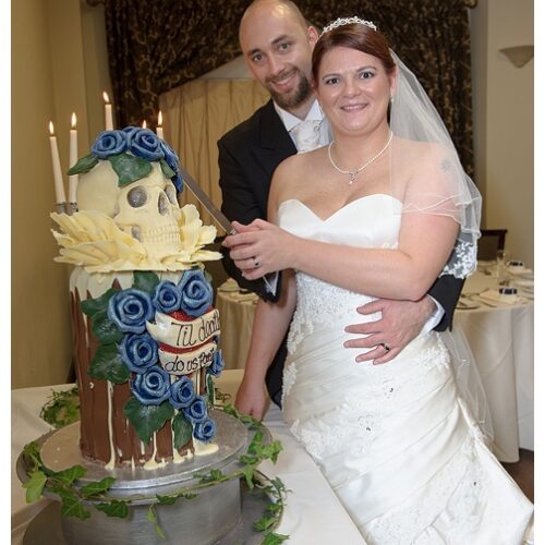 Sian & Craig - Bride and Groom Cutting the cake